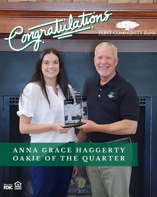 picture of Anna Grace Haggerty receiving the Oakie of the Quarter award from Scott Tomlinson